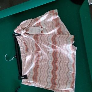 Mini skort  size M  67%polyester 29% Rayon 4%Spandex.